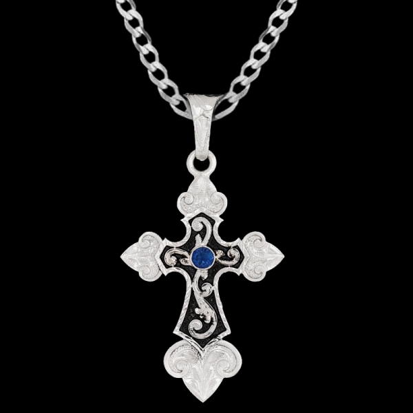 Chronicles, Unique German Silver 1.5"x2" cross with detailed scrollwork, black enamel, and cubic zirconia.

 

Chain not included.